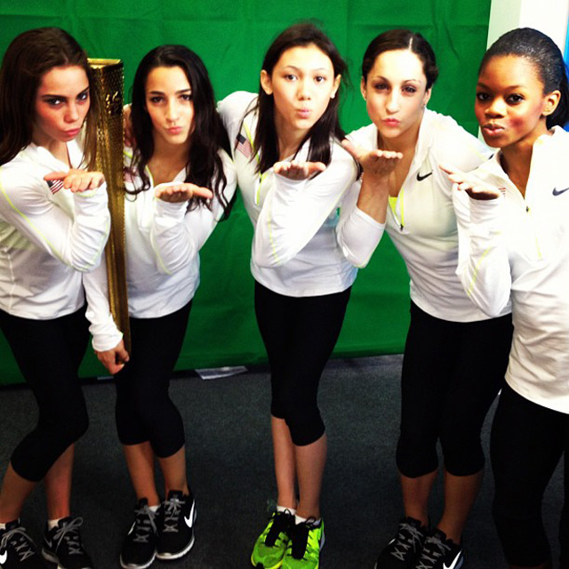 US Women's Gymnastics Team with the Olympic Torch