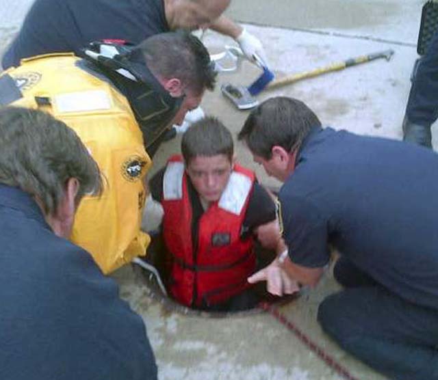 boy swept into sewer flash flood ohio rescue