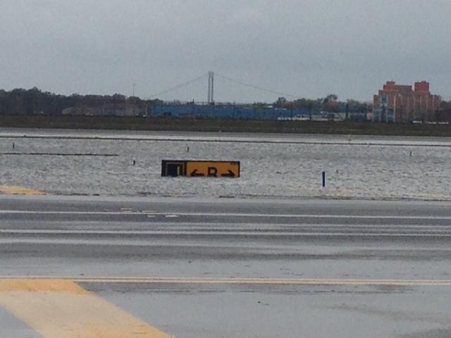 flooded runway laGuardia airport hurricane sandy nyc photos