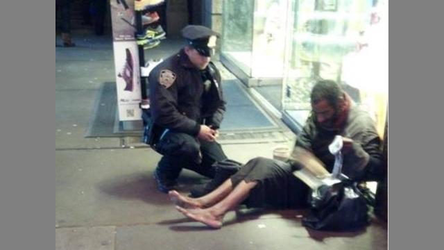 homeless guy boots ny cop