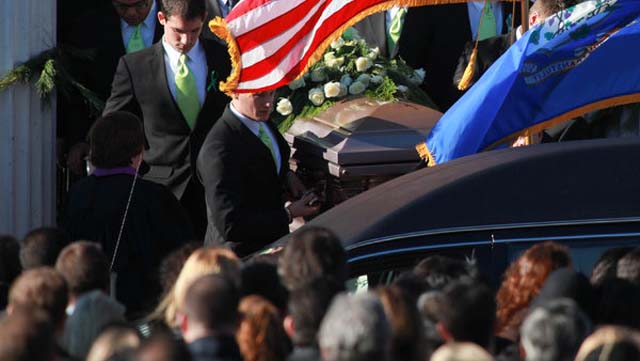 Soto's Casket is Carried out of Lordship Community Church in Newtown, Connecticut.
