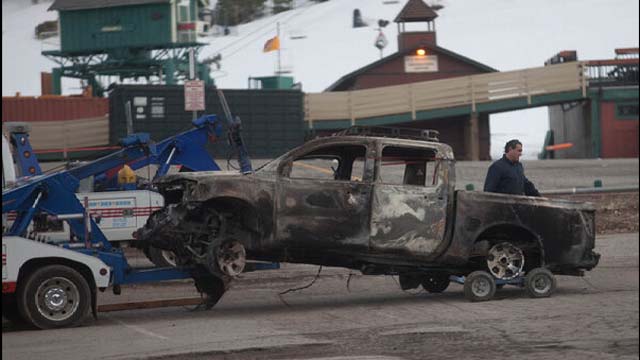 Christopher Jordan Dorner manhunt, Big Bear Lake, Nissan Titan Truck, burned out, door to door, San Bernadino County.