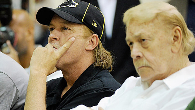 Jim Buss pictured with his father court side at the Lakers.