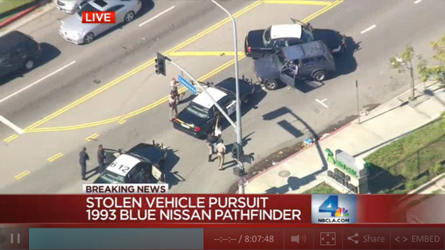 Highway Pursuit on Southern California Freeway Freeway chase Ends in West LA 1993 Nissan blue pathfinder