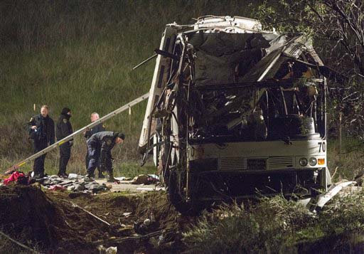 Remains of crashed tour bus