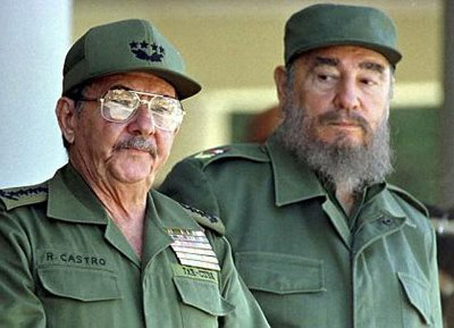Fidel Castro (left) with his brother Raul Castro (right)