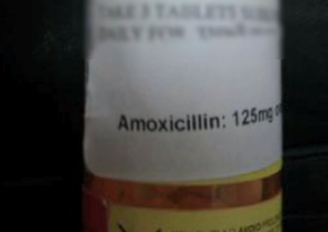 The pill bottle, allegedly altered to pose as antibiotics. (WPTV screenshot)