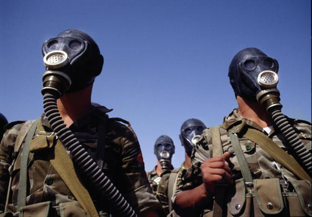 Syrian troops photographed during a gas mask training exercise during the run up to the first Gulf War. (Getty Images)