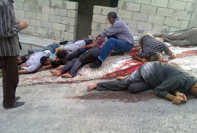 Citizen journalism image of the massacre released by a group that calls itself The Syrian Revolution Against Bashar Assad