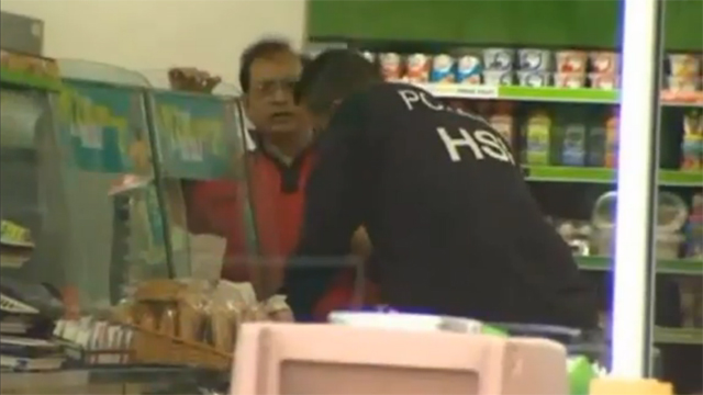 Owner speaking with Police Immigration Scam