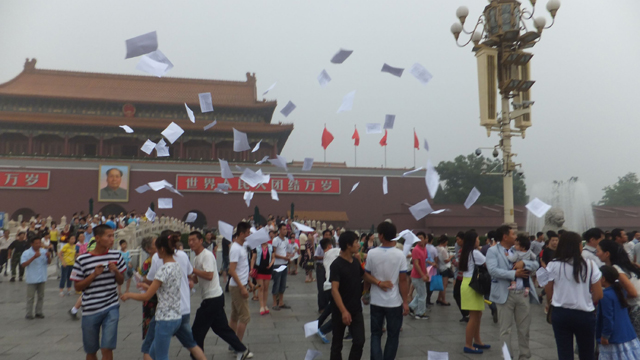 "Snapping pics of The Gate of Heavenly Peace when suddenly about two dozen people simultaneously started shouting and throwing flyers in the air. I couldn't believe my eyes: was this what I thought it was?" -- Reddit user tianamenthrowaway