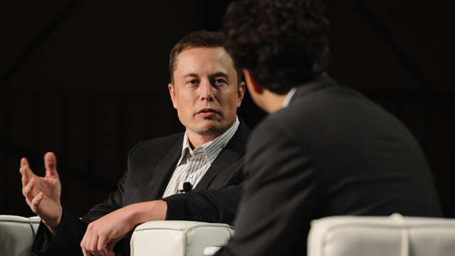 CEO & CTO of Space Exploration Technologies, Co-Founder & CEO of Tesla Motors Elon Musk (L) and TechCrunch Co-Editor Erick Schonfeld speak onstage at Day 3 of TechCrunch Disrupt SF 2011 (Getty Images)