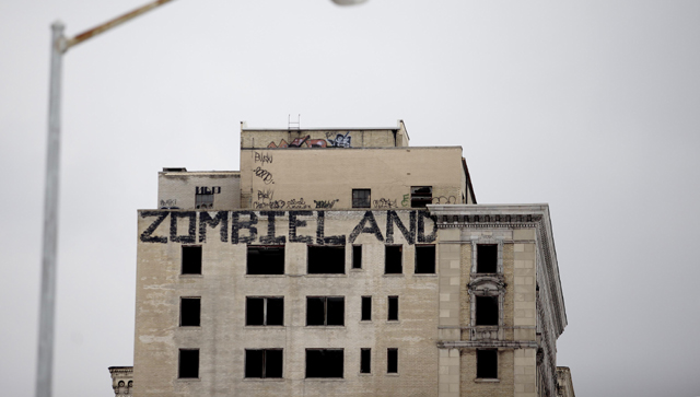 Graffiti covers an abandoned building in Detroit  (Getty Images)