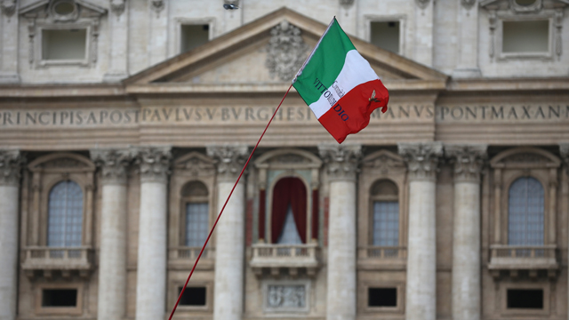 An Italian flag flies in St Peter's Square (Getty Images)