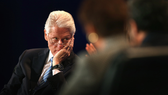 Former President Bill Clinton moderates a panel discussion  (Getty Images)