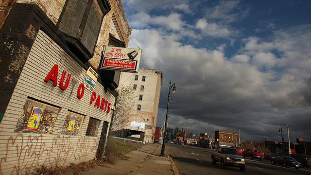 Shuttered businesses line on downtown Detroit street (Getty Images)
