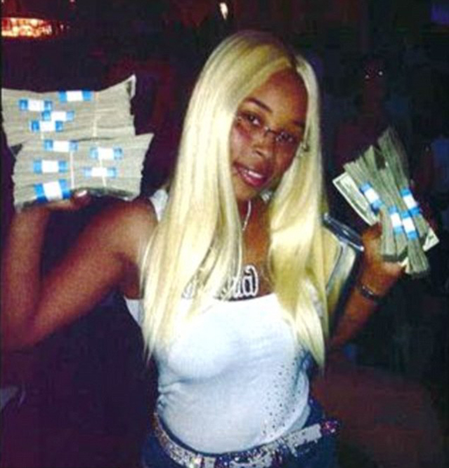 Rashia Wilson posing with money in a Facebook photo (Image courtesy of Tampa Bay Police Department)