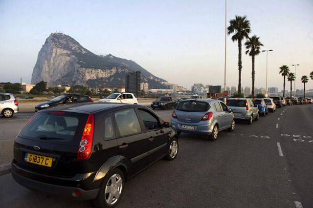 Motorists wait in line at the border crossing between Spain and Gibraltar on Monday blasted a Spanish threat to impose a 50-euro ($66) car toll at the border with the tiny British-held territory as North Korean-style "sabre rattling".  It was the latest in a string of spats going back decades between Spain and Gibraltar, frequently sparked by disputes over fishing rights around the British outpost that Madrid wants to reclaim as its own.      (Getty Images)