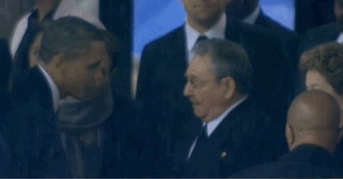 obama shakes hands with castro gif