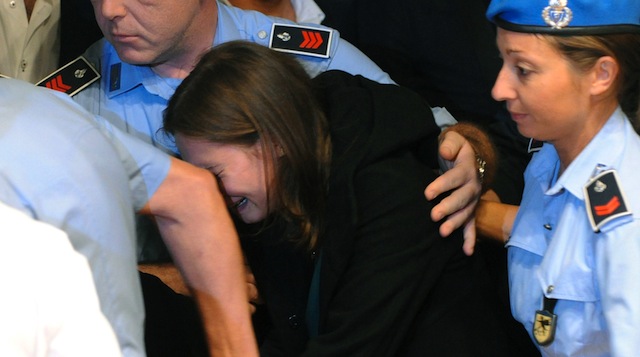 October 2011, Amanda Knox breaks down in tears after hearing the verdict that overturns her conviction and acquits her of murder. (Getty)