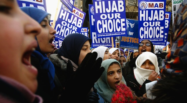 : A group of Muslim women demonstrate outside the French Embassy on January 17, 2003 in London. Thousands of Muslim's took to the streets in London and Edinburgh to demonstrate against the French governments ban on religious apparel. (Getty)