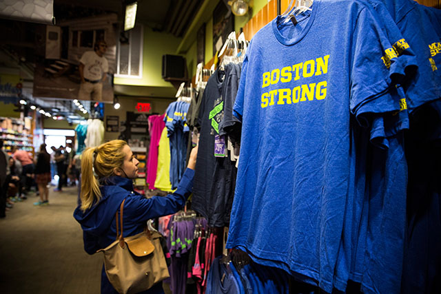 A woman looks at Boston Strong merchandise in advance of this year's marathon. (Getty)