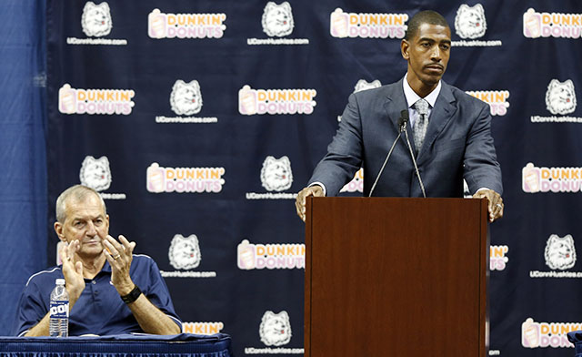 With Jim Calhoun looking on, Ollie was introduced as UConn's head coach on Sept. 13, 2012. (Getty)