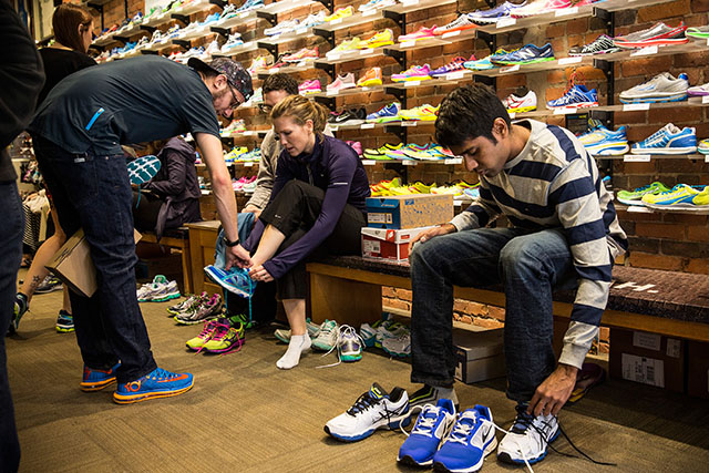 People shop for running shoes Sunday, April 3 inside Marathon Sports. One of the bombs at last year's marathon went off directly in front of the store (Getty)