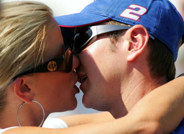 Kurt Busch shares a kiss with his now ex-wife, Eva Bryan, before they were separated in 2011. (Getty)