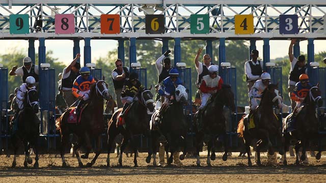 The horses take off at the 145th running of the Belmont Stakes. (Getty)
