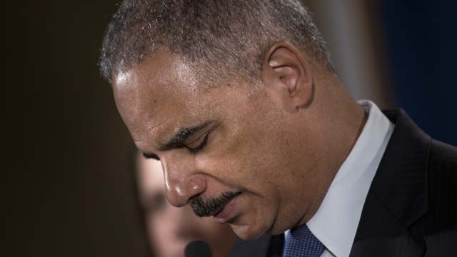 why did eric holder resign