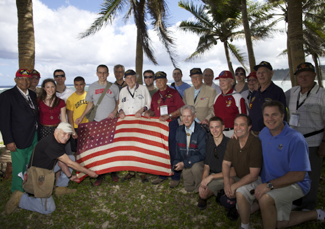 (handout - Rep. Braley and group of Iwo Jima veterans and Ohio State University students https://www.flickr.com/photos/repbraley/6987929909/)