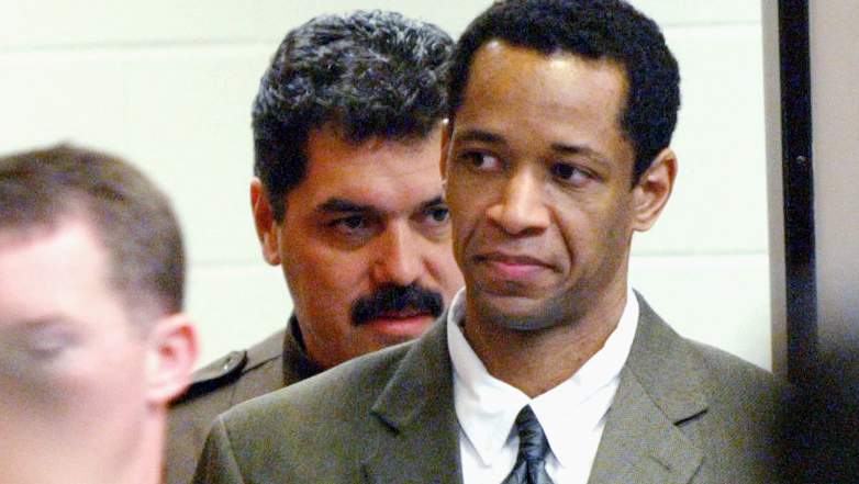 Washington area sniper suspect John Allen Muhammad is led into court by sheriff deputies after a break in his trial at the Virginia Beach Circuit Court November 6, 2003.