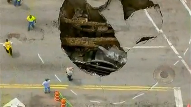 Toledo Sinkhole Swallows Car With Driver Trapped Inside Heavy Com
