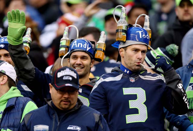 Seahawks 49ers NFC Championship Game Russell Wilson Colin Kaepernick The 12th Man.