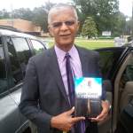 Jackson Mississippi Mayor Chokwe Lumumba dead holds-book-by-jacksons-tommy-mabry