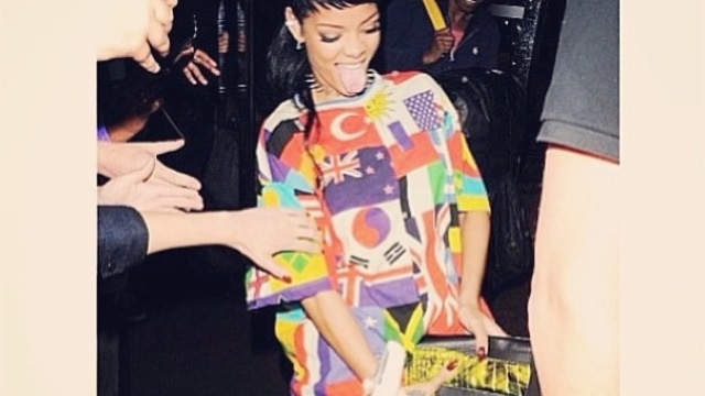 Photos Rihanna Gets Playful With Designer Cock Clutch Purse