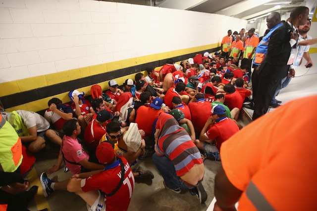 Chile fans break into stadium