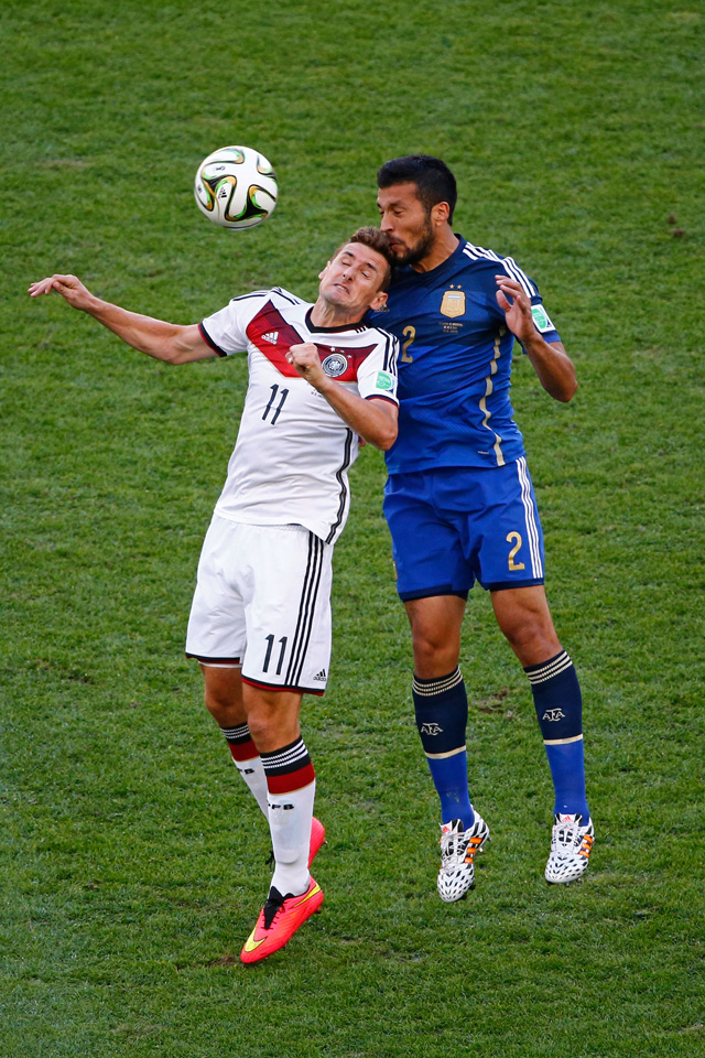 germany vs argentina, world cup final photos, Miroslav Klose of Germany and Ezequiel Garay of Argentina