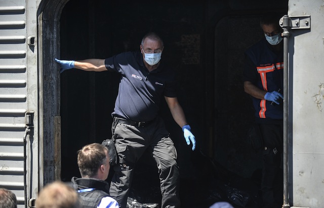 MH17 victims bodies, Malaysian Airlines plane shot down, Russian separatists, Torez, Ukraine