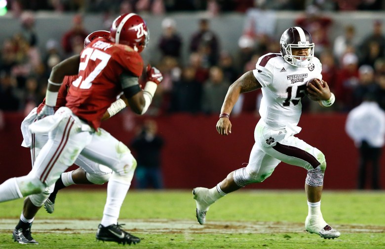 Dak Prescott ran for 82 yards in Mississippi State's loss to Alabama. (Getty)