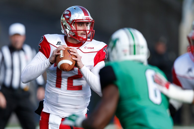 Western Kentucky's Brandon Doughty leads the FBS with 4,344 yards and 44 touchdowns. (Getty)