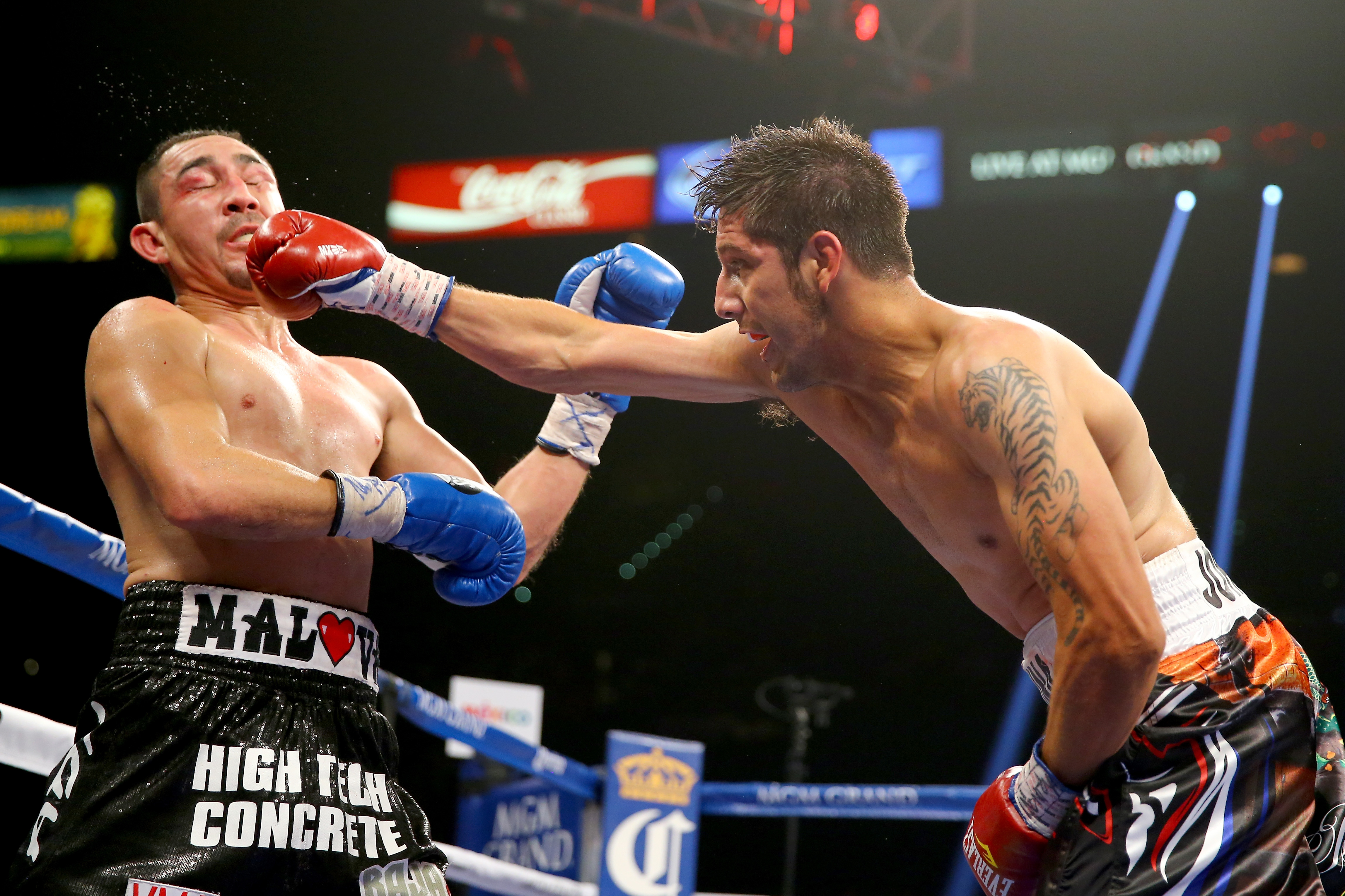 John Molina Jr. (R) connects with a right to the face of Humberto Soto.  (Photo by Al Bello/Getty Images)