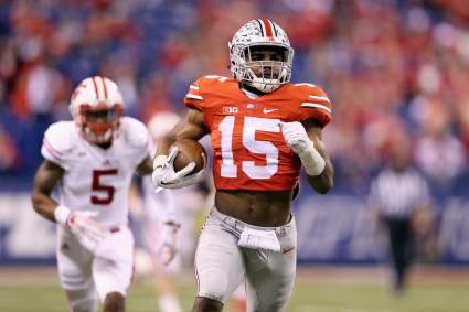 WATCH: Ezekiel Elliott Hurdles Player & Runs for 54 Yards
