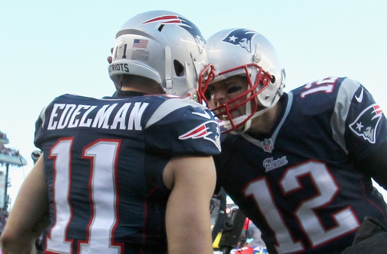 Julian Edelman and Tom Brady lead New England against Baltimore in Saturday's AFC Divisional Playoffs. (Getty)