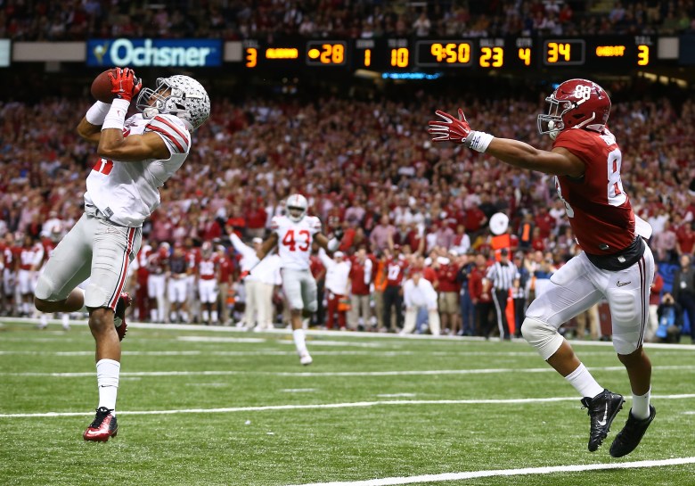 Vonn Bell intercepts a Blake Sims pass during Ohio State's 42-35 win over No. 1 Alabama on Thursday in the Sugar Bowl. The 3rd-ranked Buckeyes advanced to the National Championship Game to face No. 2 Oregon. (Getty)
