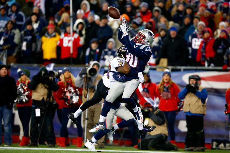 Duron Harmon picks off a Joe Flacco pass in the end zone late in the 4th quarter of the Patriots' 35-31 win over Baltimore on Saturday. (Getty)
