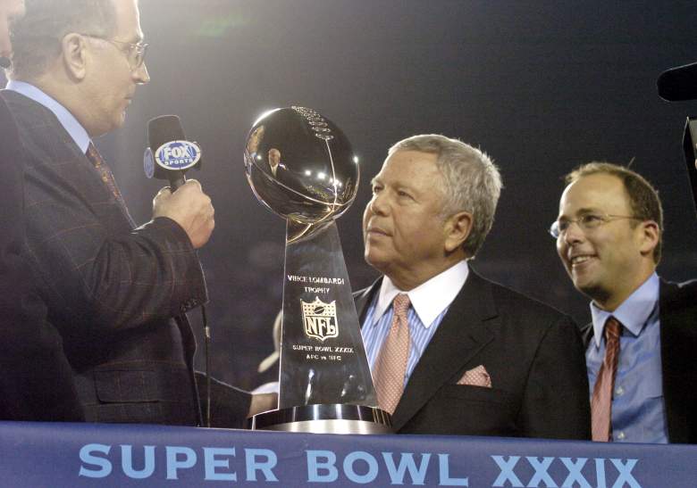 Patriots owner Robert Kraft holds the Lombardi Trophy after the 2005 Super Bowl, New England's second title in a row. (Getty)