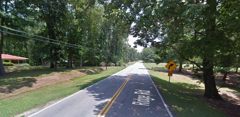 The family lived along this quiet country road in Hiram, Georgia, about 20 miles east of Atlanta. (Google Street View)