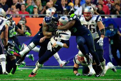 WATCH: Tom Brady Intercepted by Bobby Wagner